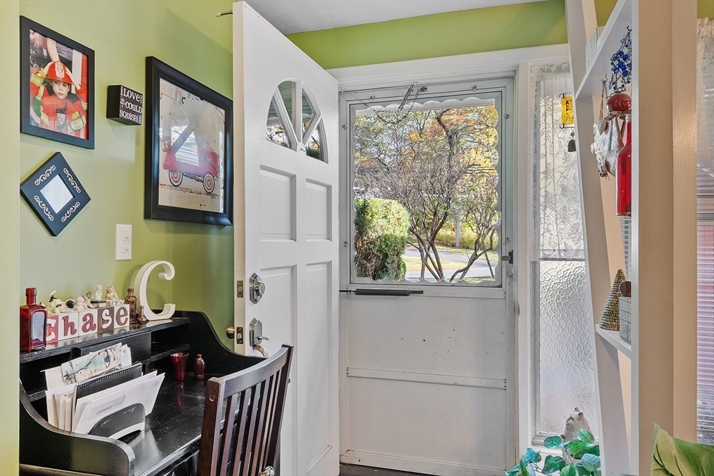 36 Brownlea Road Framingham, MA 01701 - Photo 4 of 24 a view of a dining room with furniture a chandelier and a window