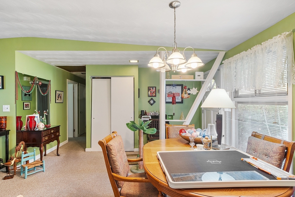 36 Brownlea Road Framingham, MA 01701 - Photo 7 of 24 a view of a dining room with furniture window and outside view