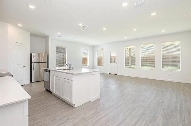 a view of a house with a garden