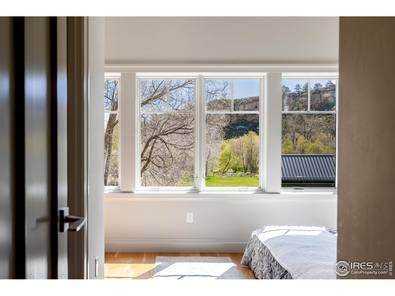 354 Apple Valley Road Lyons, CO 80540 - Photo 20 of 40 a view of a door and a window