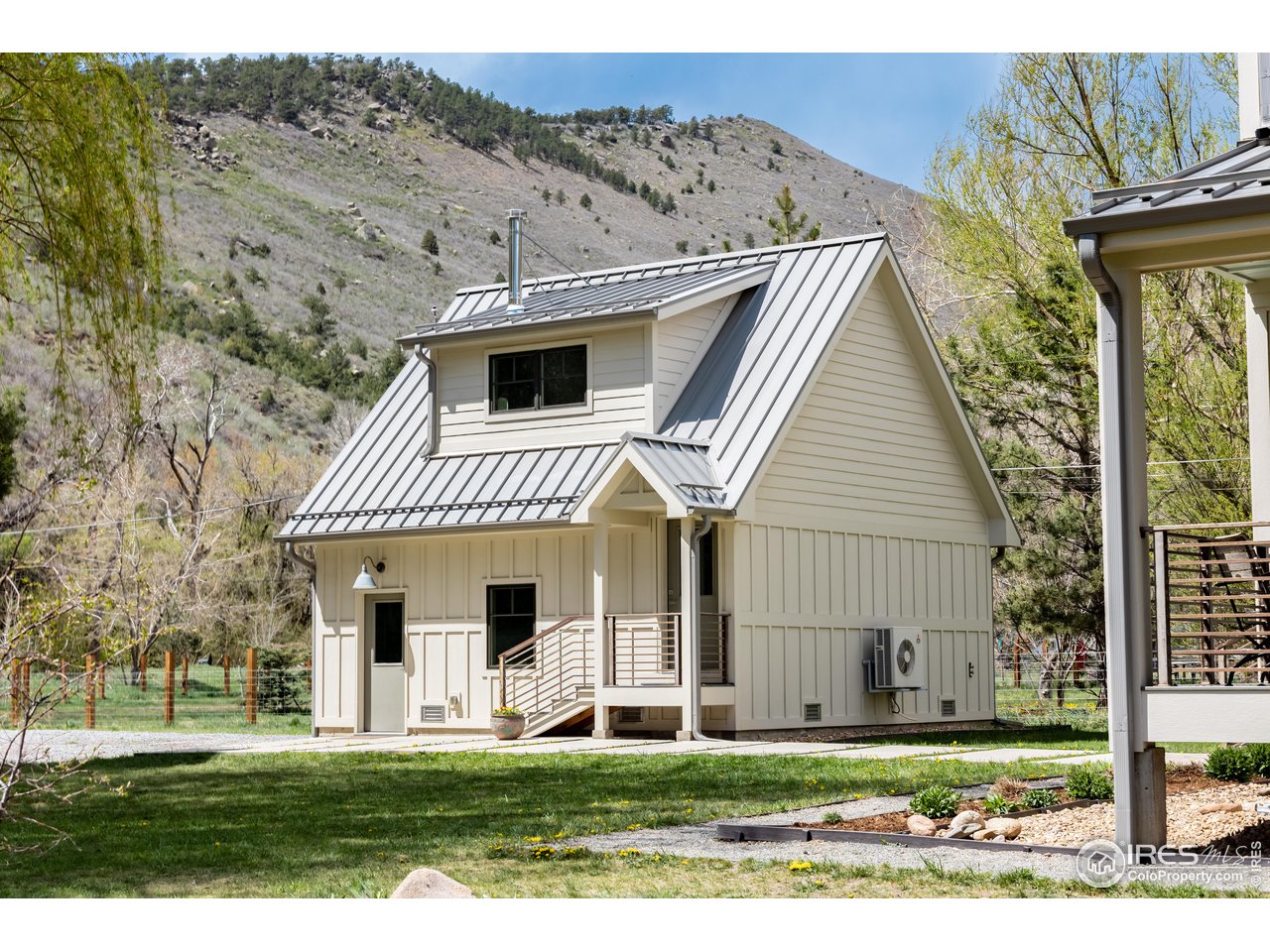 354 Apple Valley Road Lyons, CO 80540 - Photo 35 of 40 a front view of a house with a yard
