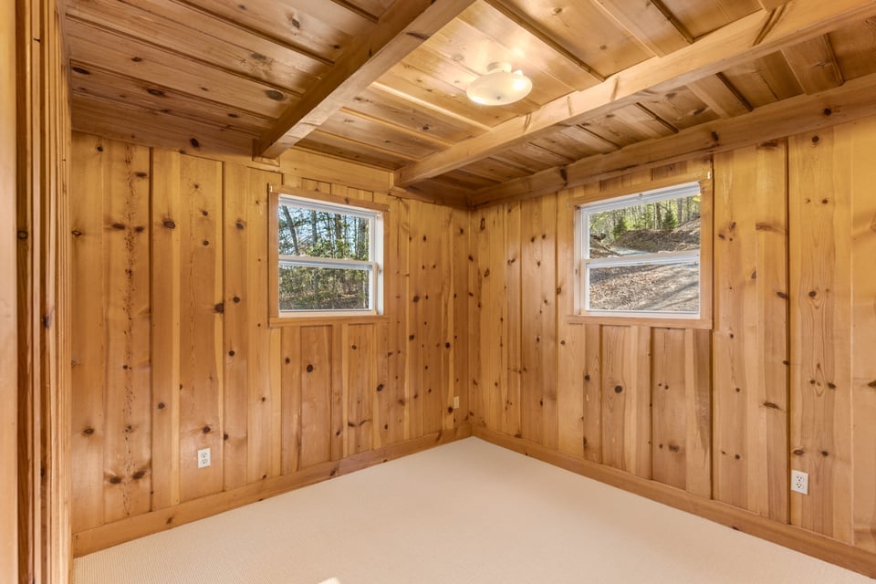795 Buck Falls Road Highlands, NC 28741 - Photo 29 of 39 Bedroom with solid wood ceiling, new carpet, and updated windows