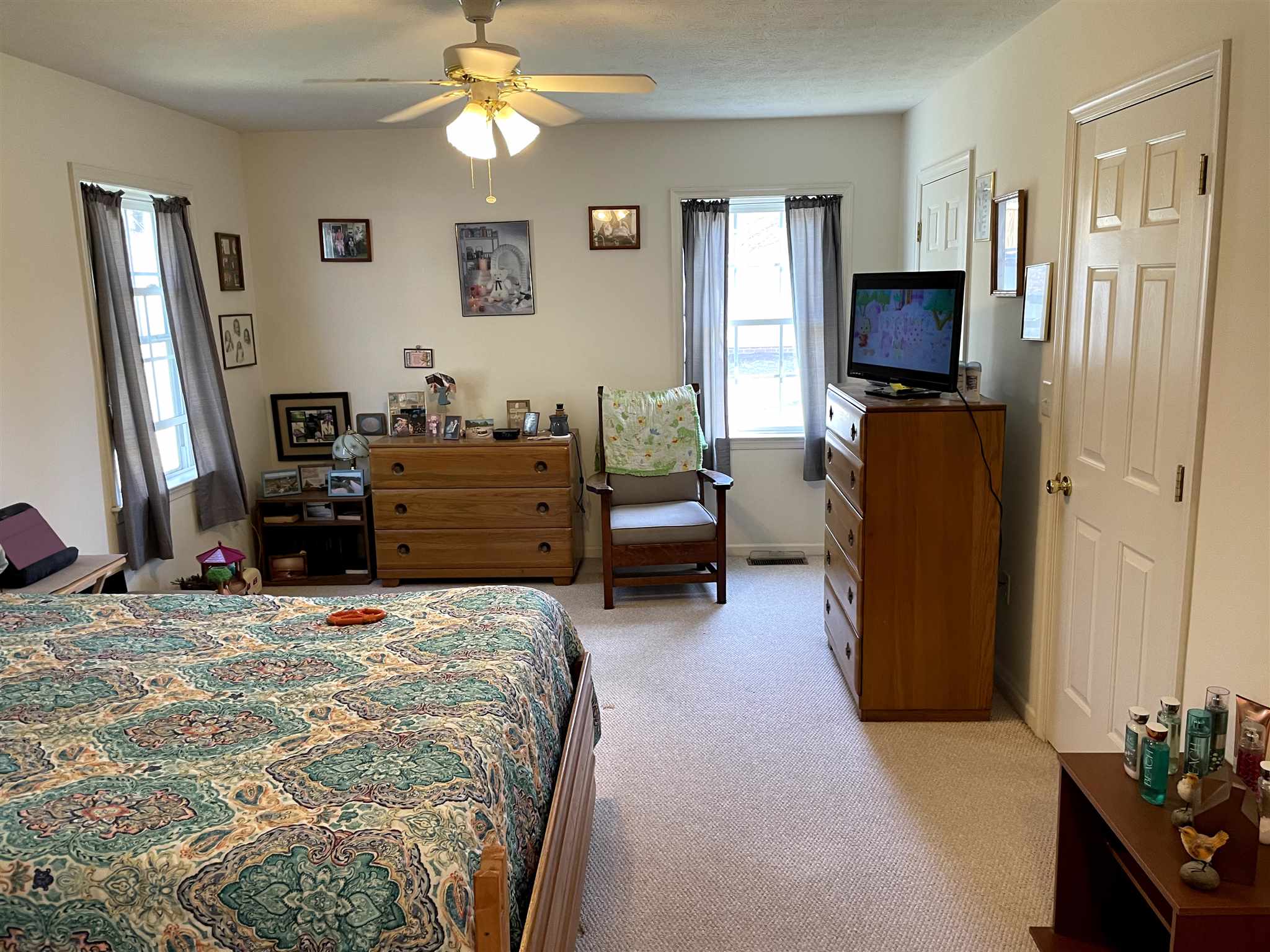 907 Reaper Road Staunton, VA 24401 - Photo 14 of 29 a bed room with a bed mirror and a window