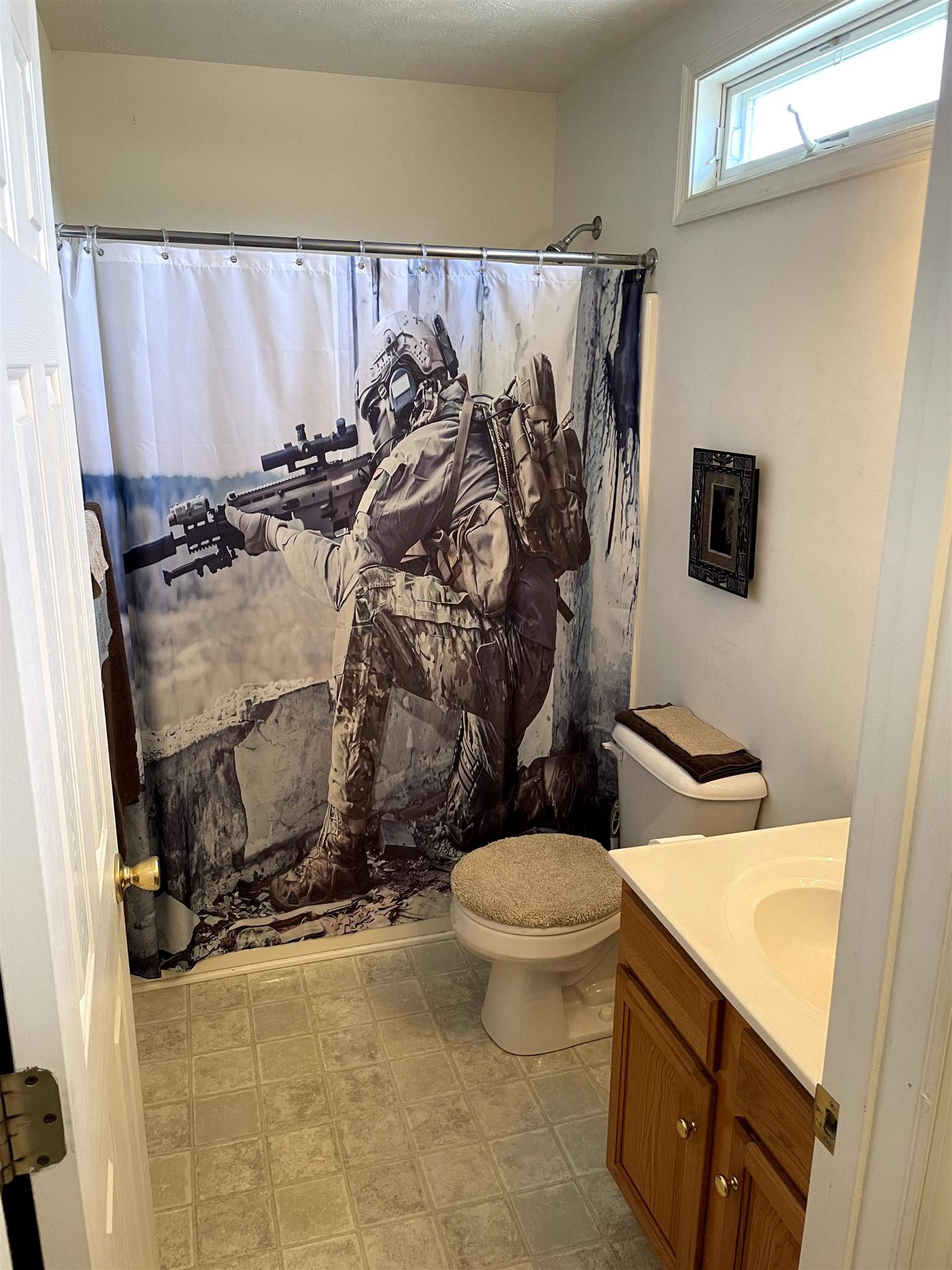 907 Reaper Road Staunton, VA 24401 - Photo 23 of 29 a bathroom with a toilet and a shower curtain