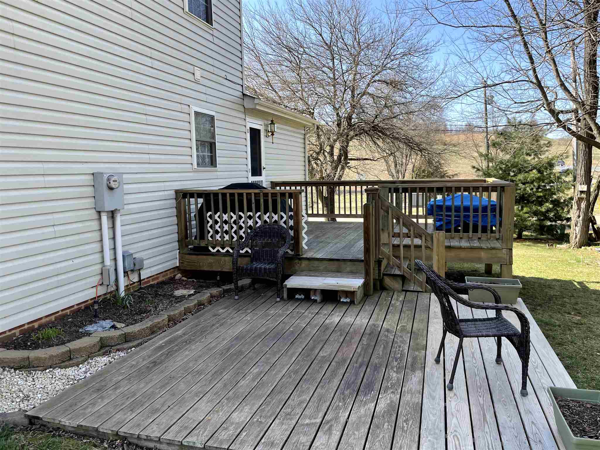 907 Reaper Road Staunton, VA 24401 - Photo 5 of 29 a view of a chairs on the deck