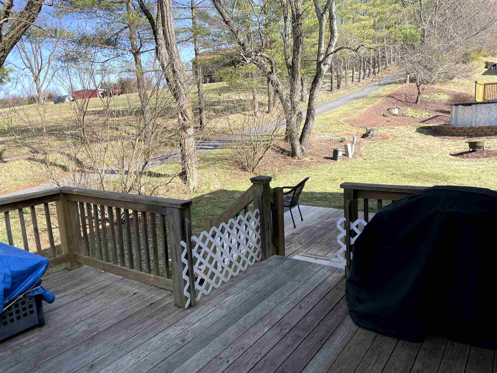 907 Reaper Road Staunton, VA 24401 - Photo 6 of 29 a balcony with wooden floor table and chairs
