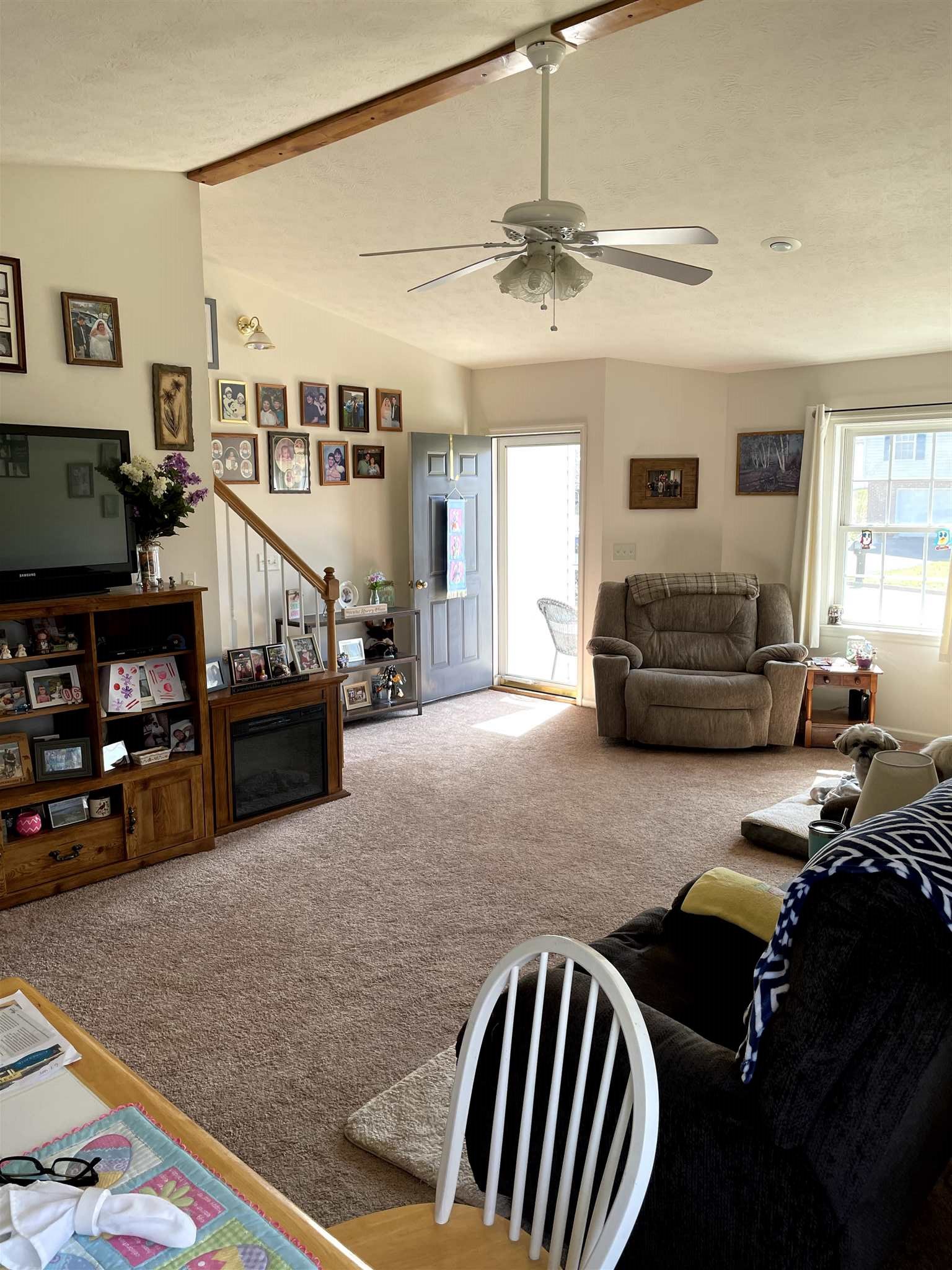 907 Reaper Road Staunton, VA 24401 - Photo 8 of 29 a living room with furniture and a flat screen tv