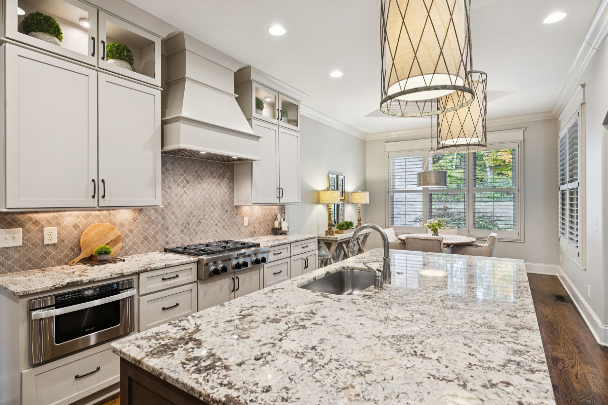 1741 Ravello Way Brentwood, TN 37027 - Photo 21 of 80 a kitchen with a stove a sink and a refrigerator