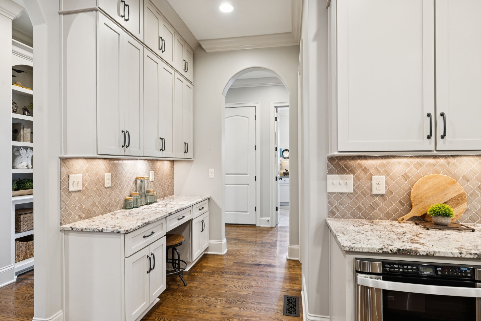 1741 Ravello Way Brentwood, TN 37027 - Photo 26 of 80 a kitchen with granite countertop a stove and a sink