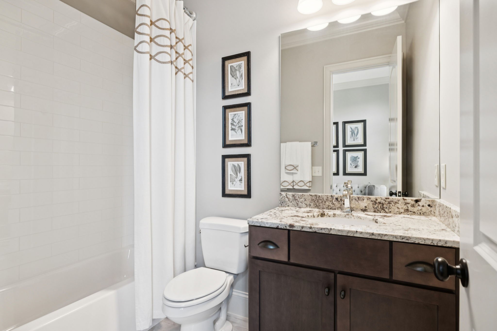 1741 Ravello Way Brentwood, TN 37027 - Photo 41 of 80 a bathroom with a sink a toilet and shower