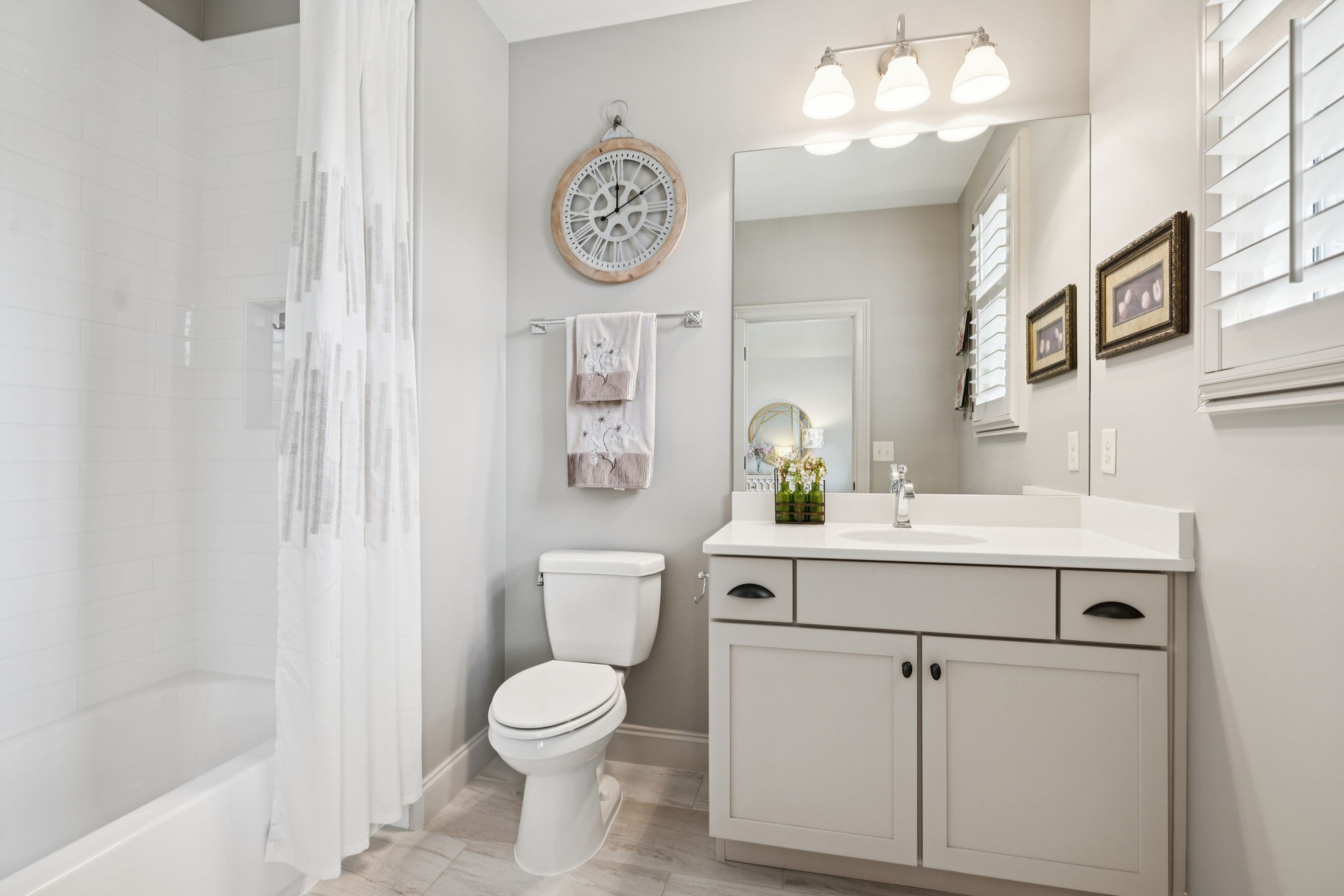 1741 Ravello Way Brentwood, TN 37027 - Photo 53 of 80 a view of bathroom with a toilet sink and mirror