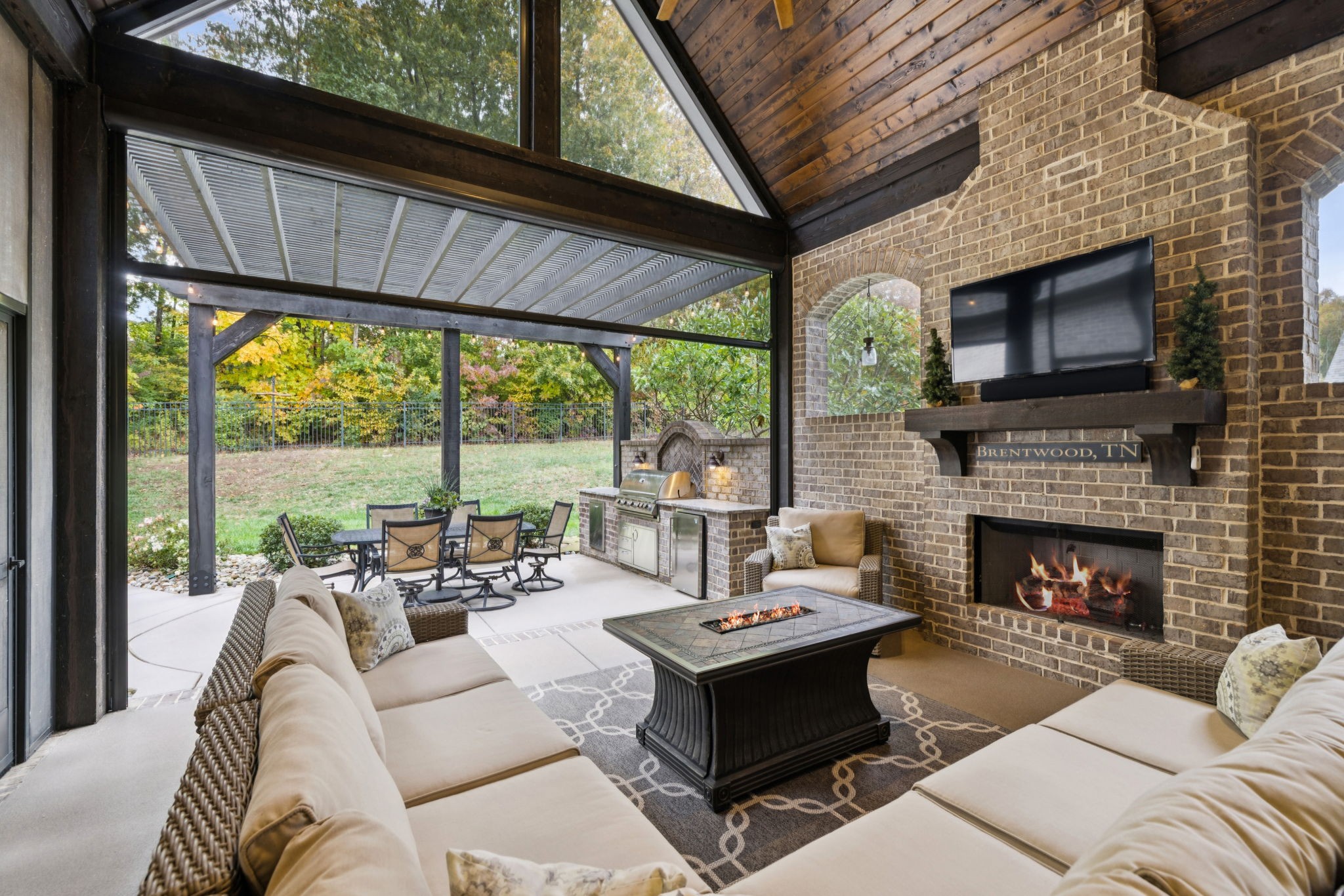 1741 Ravello Way Brentwood, TN 37027 - Photo 61 of 80 a living room with furniture a fireplace and a large window