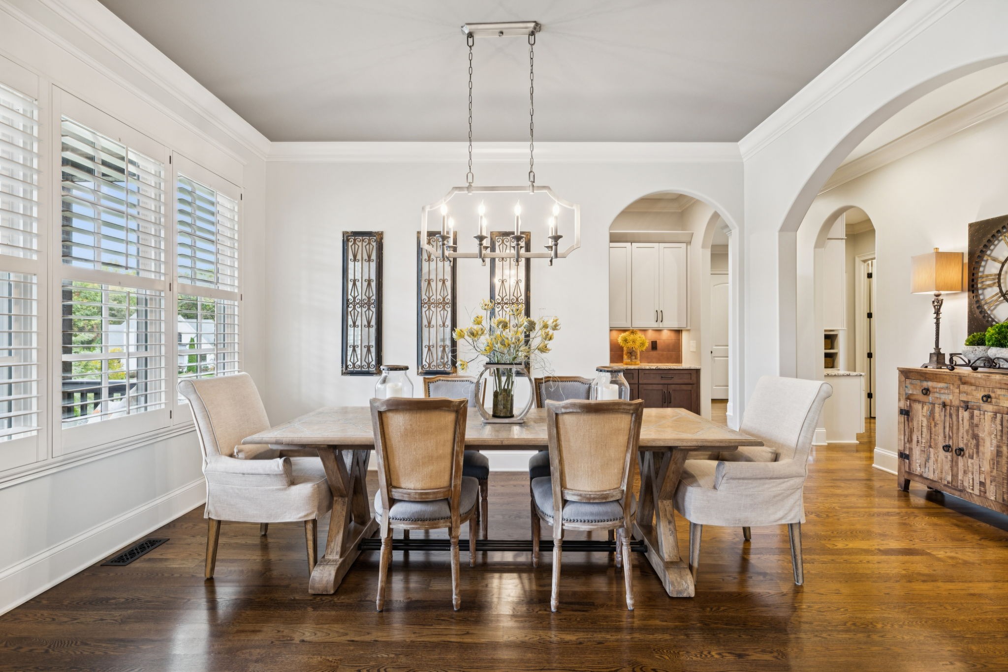 1741 Ravello Way Brentwood, TN 37027 - Photo 10 of 80 a view of a dining room with furniture window and wooden floor