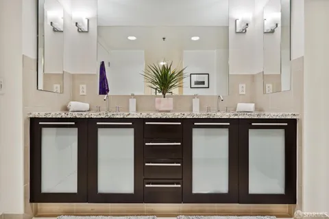 a bathroom with a tub and shower