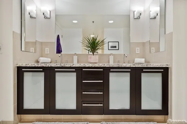 a bathroom with a tub and shower