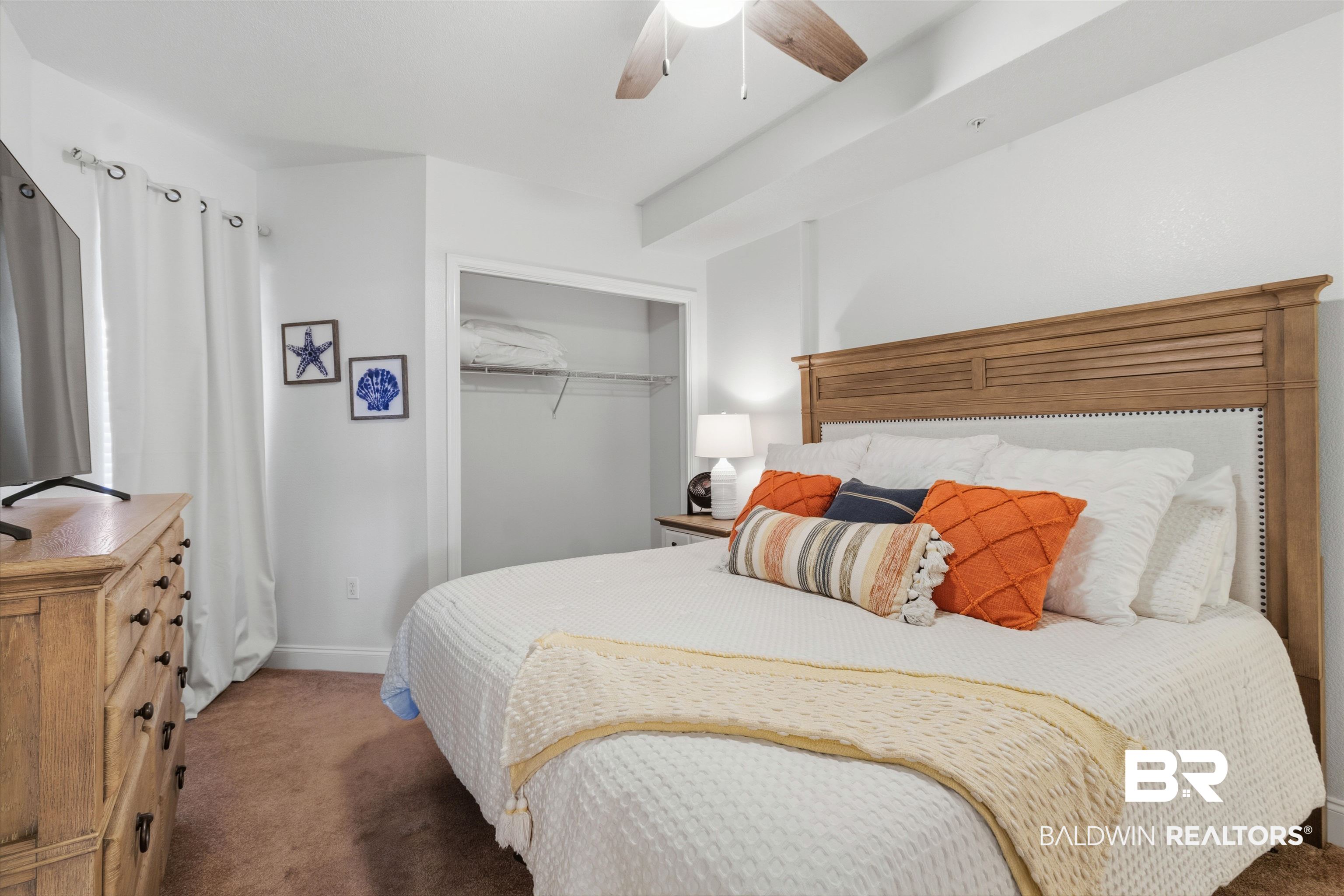 3564 Bayou Road, Unit 203 Orange Beach, AL 36561 - Photo 26 of 53 Bedroom with light brown carpeting and white walls