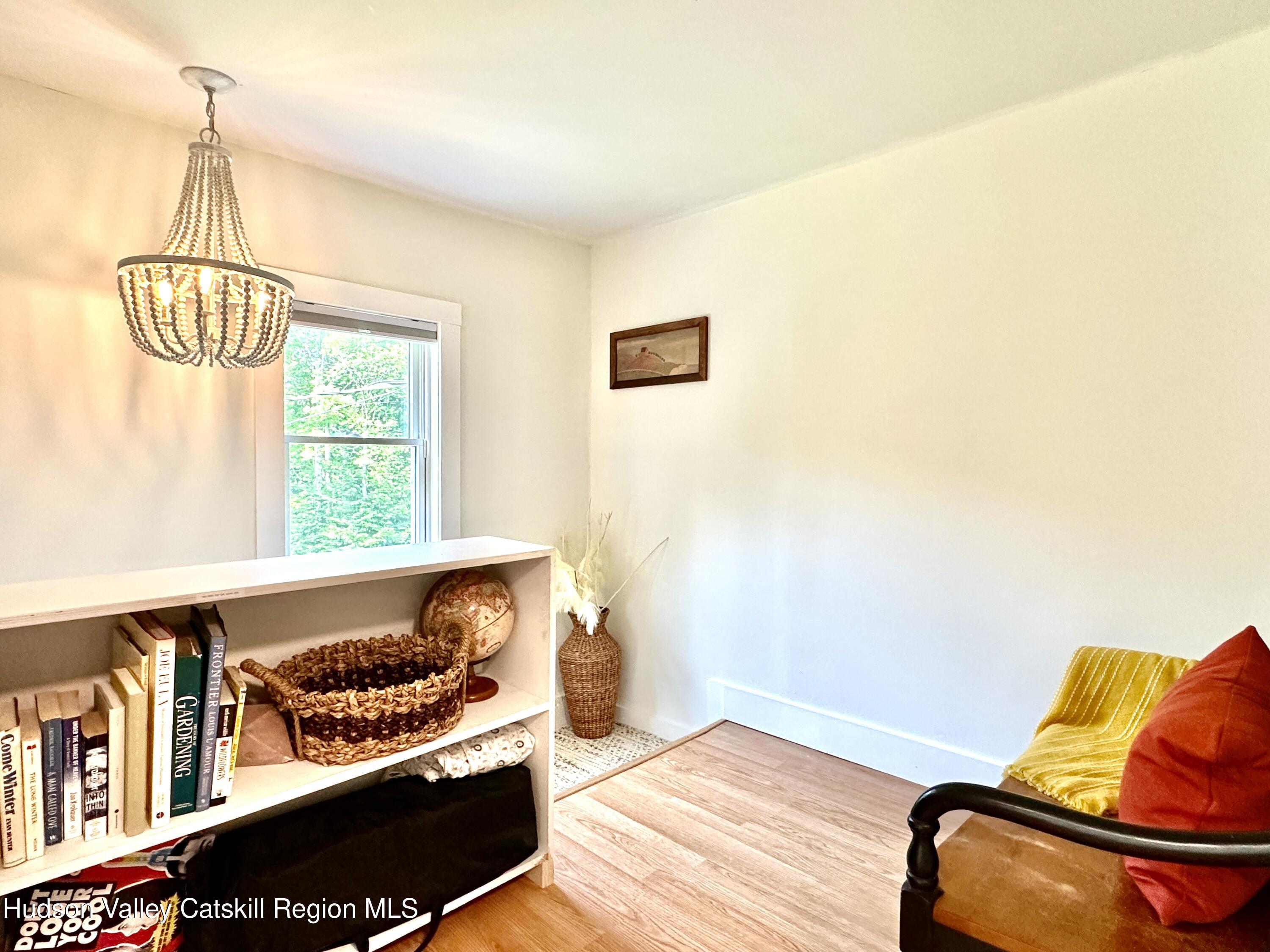 209 Griffin Road East Jewett, NY 12424 - Photo 20 of 34 a bedroom with a bed and a window