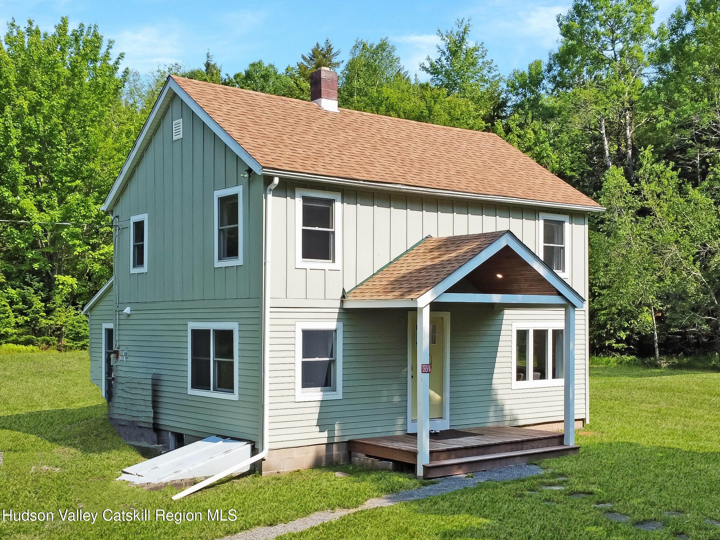 209 Griffin Road East Jewett, NY 12424 - Photo 29 of 34 a front view of a house with a yard