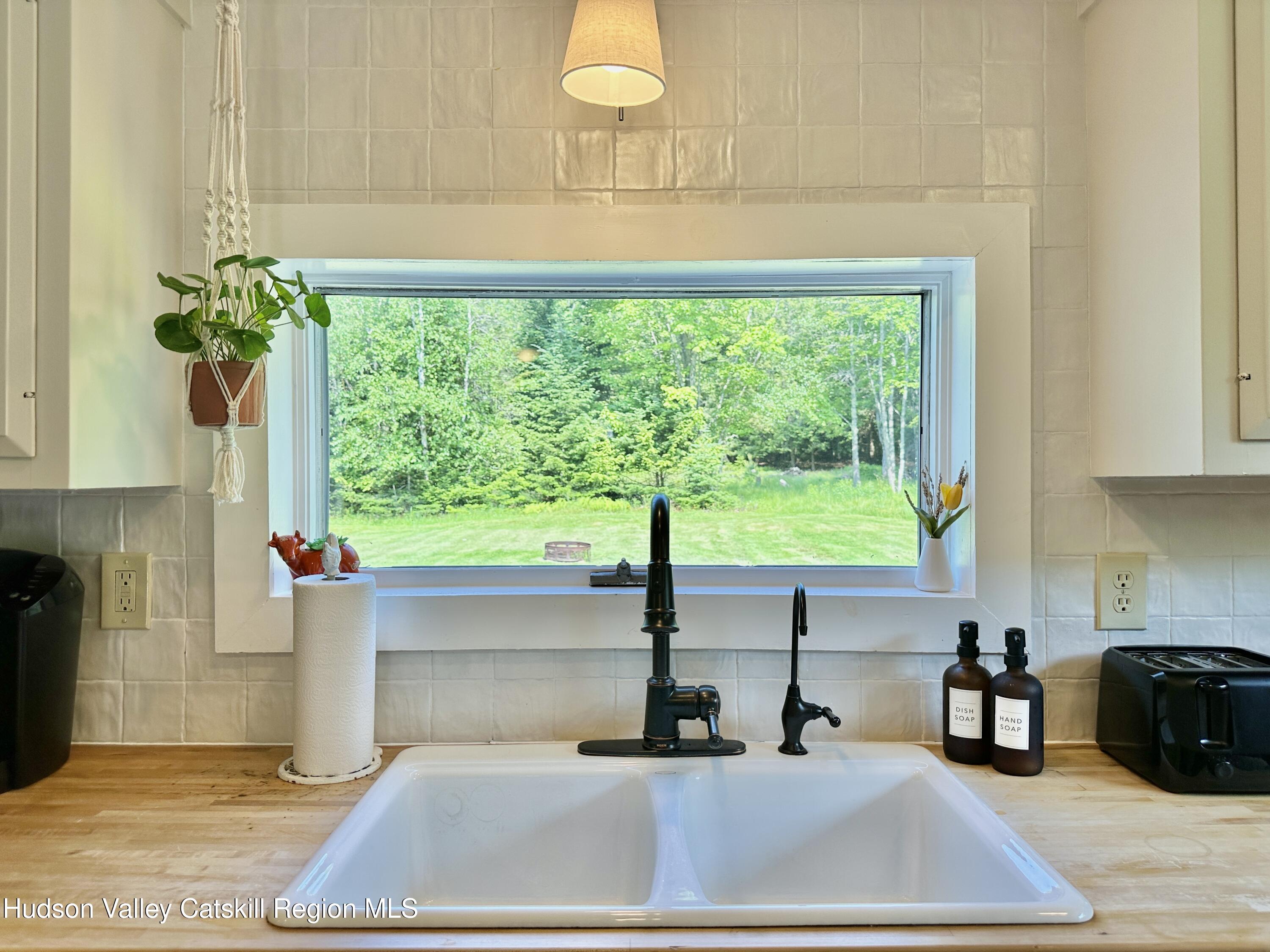 209 Griffin Road East Jewett, NY 12424 - Photo 8 of 34 a kitchen with a sink and a window