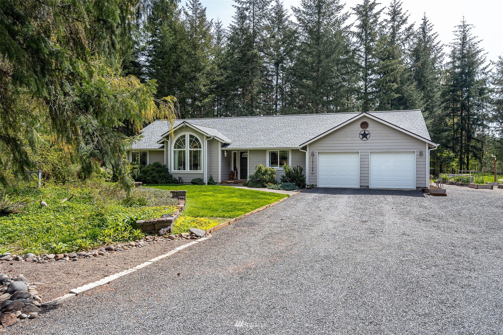 101-04 Hawkins Road Winlock, WA 98596 - Photo 1 of 40 a front view of house with yard and green space