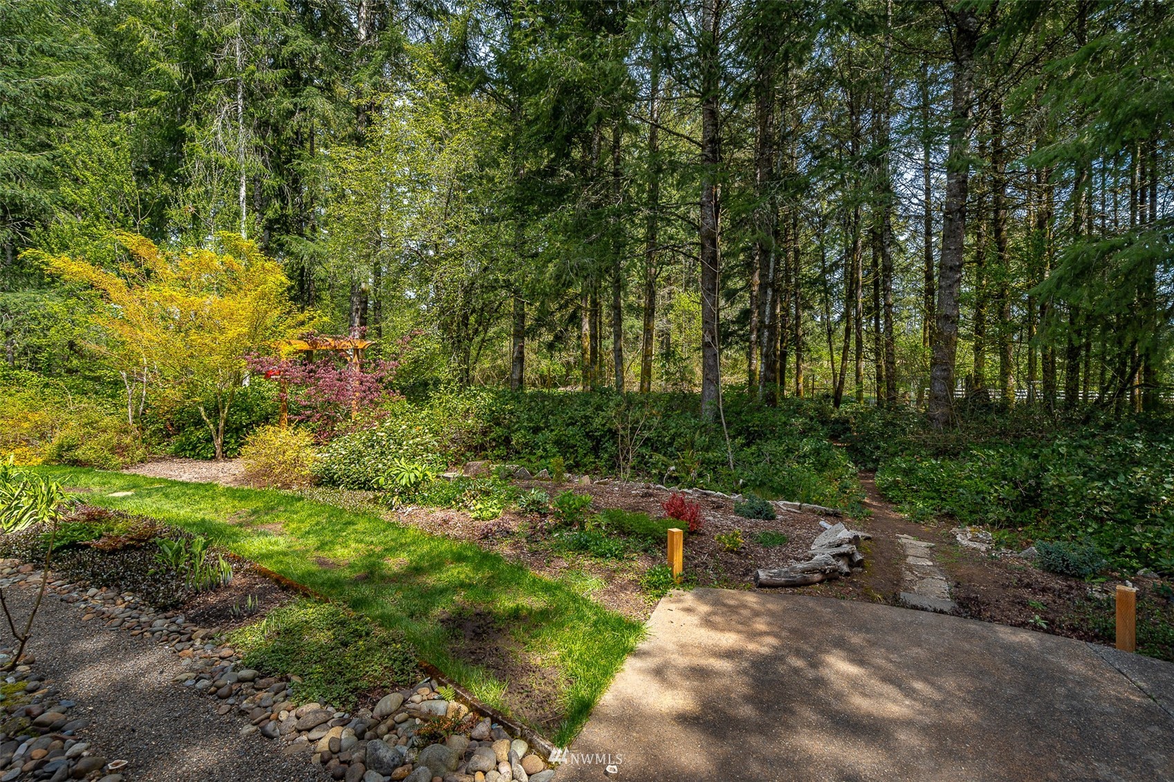 101-04 Hawkins Road Winlock, WA 98596 - Photo 16 of 40 a backyard of a house with lots of green space