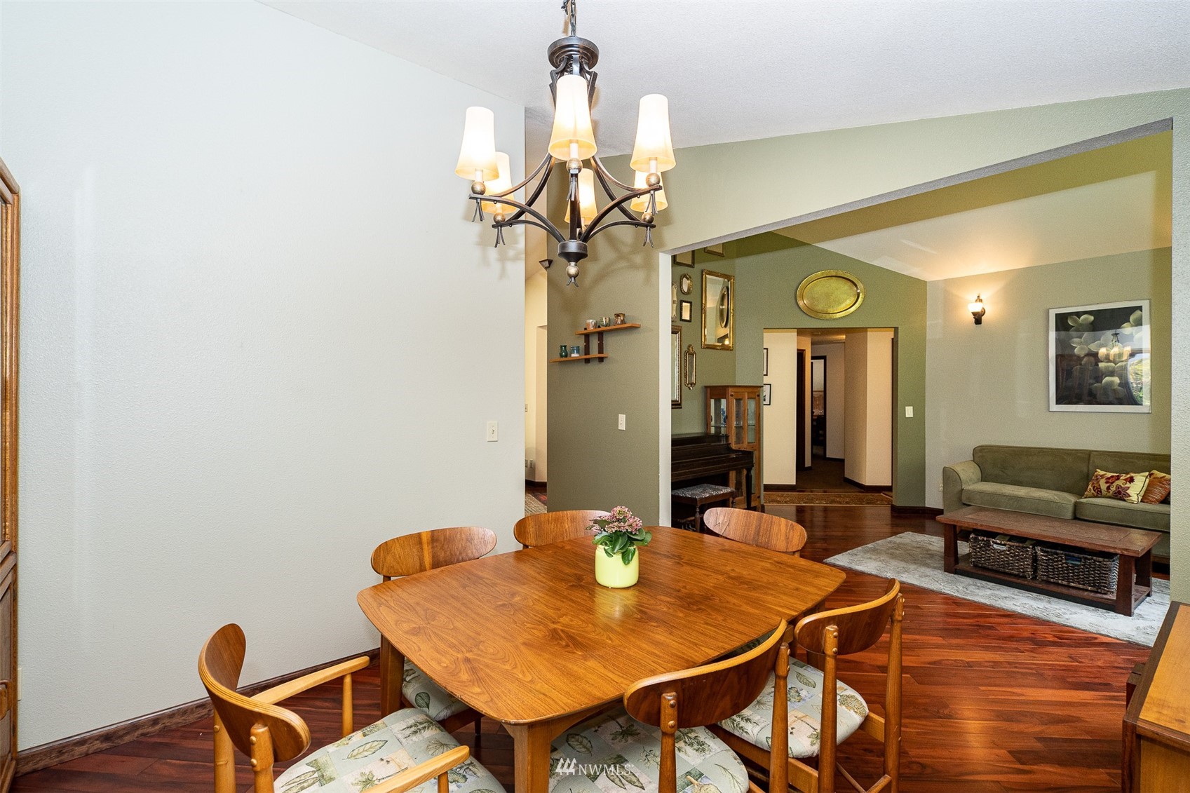 101-04 Hawkins Road Winlock, WA 98596 - Photo 28 of 40 a view of a dining room with furniture and wooden floor