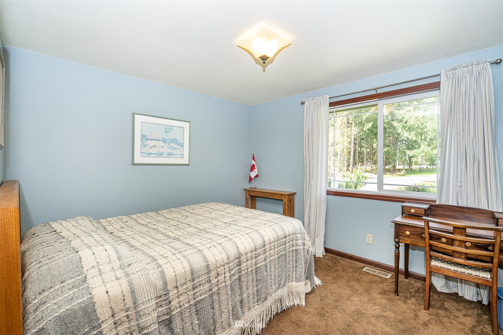 101-04 Hawkins Road Winlock, WA 98596 - Photo 38 of 40 a bedroom with a bed and a window