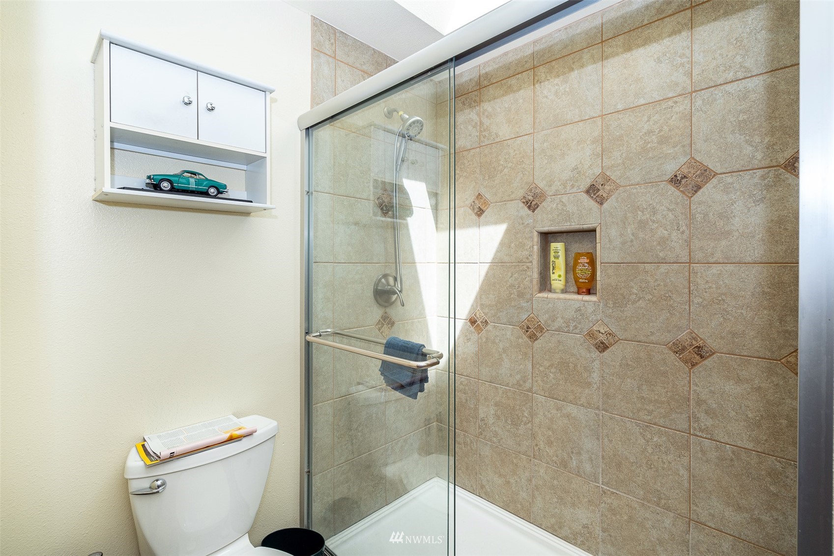 101-04 Hawkins Road Winlock, WA 98596 - Photo 39 of 40 a bathroom with a toilet and a shower