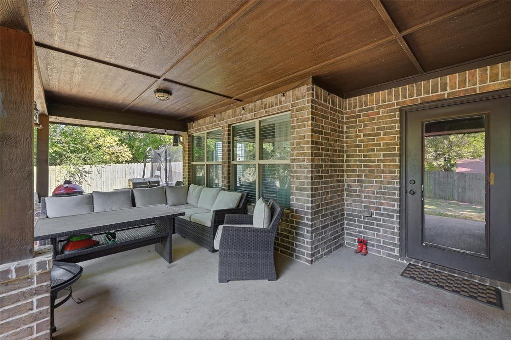 3020 West Loy Lake Road Denison, TX 75020 - Photo 23 of 32 Nice relaxing covered patio! Great space for entertaining or just to simlpy relax after a long day.