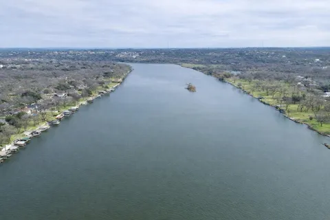 a view of a lake from a yard