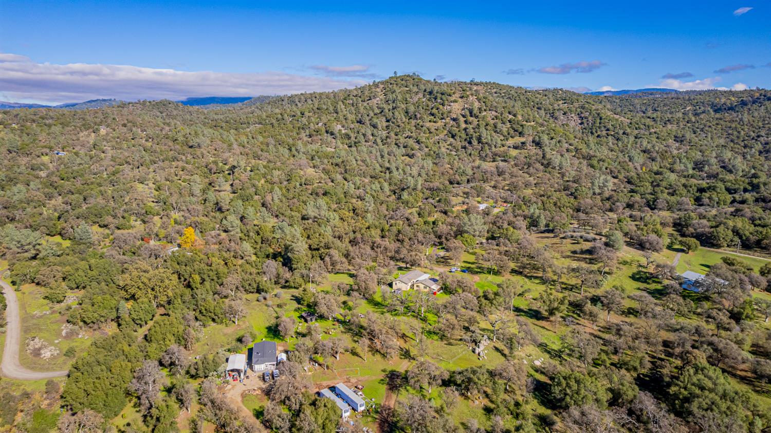 3335 Wildcat Road Mariposa, CA 95338 - Photo 41 of 48 a view of a large mountain with mountains in the background