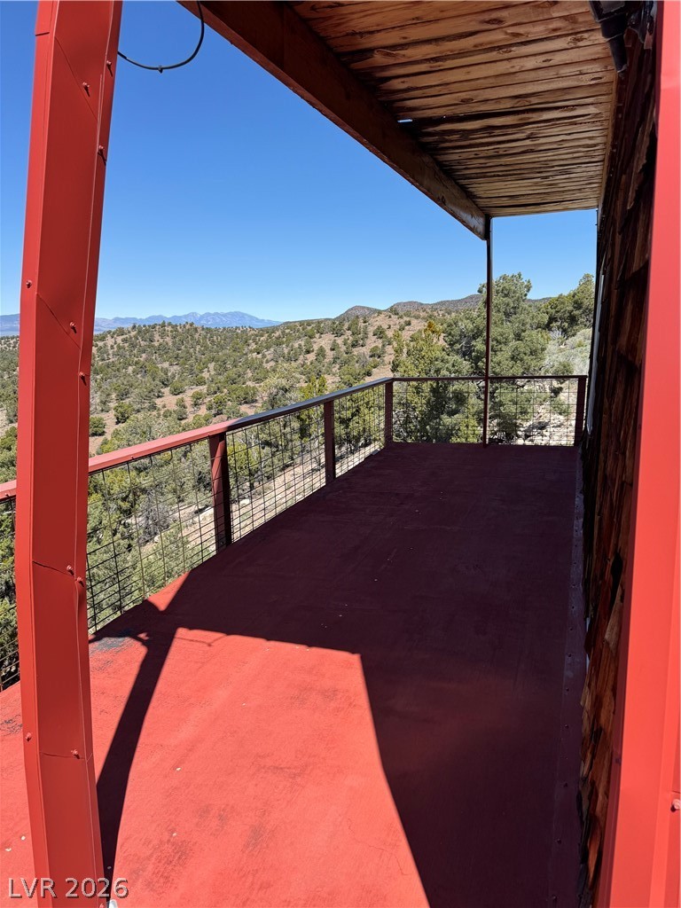 20996 Pinion Pine Road Pioche, NV 89043 - Photo 18 of 19 This outdoor space provides expansive views of rolling hills and distant mountains.