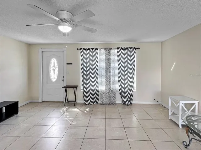 a view of an empty room with a sink