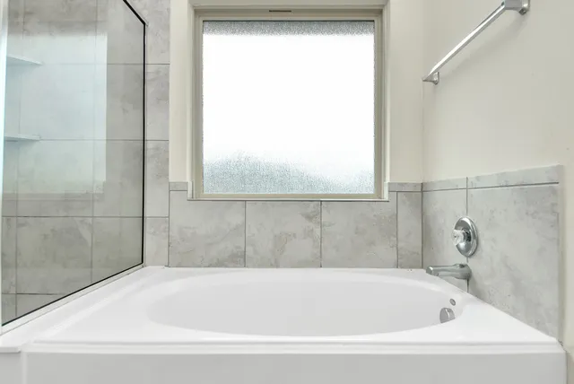 a bathroom with a bathtub