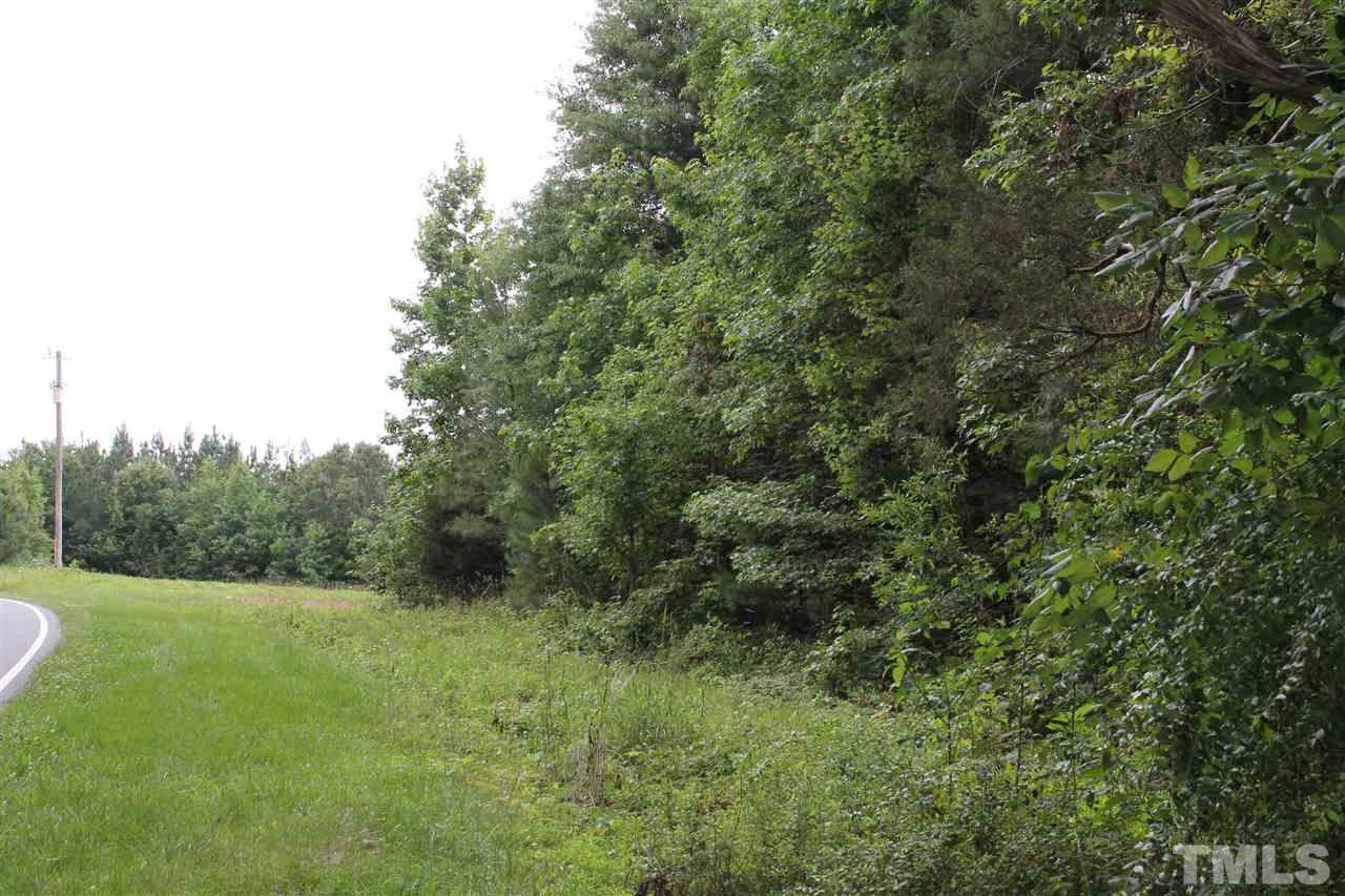 0 Houston Blalock Road Roxboro, NC 27574 - Photo 1 of 4 a view of a lush green forest with large trees