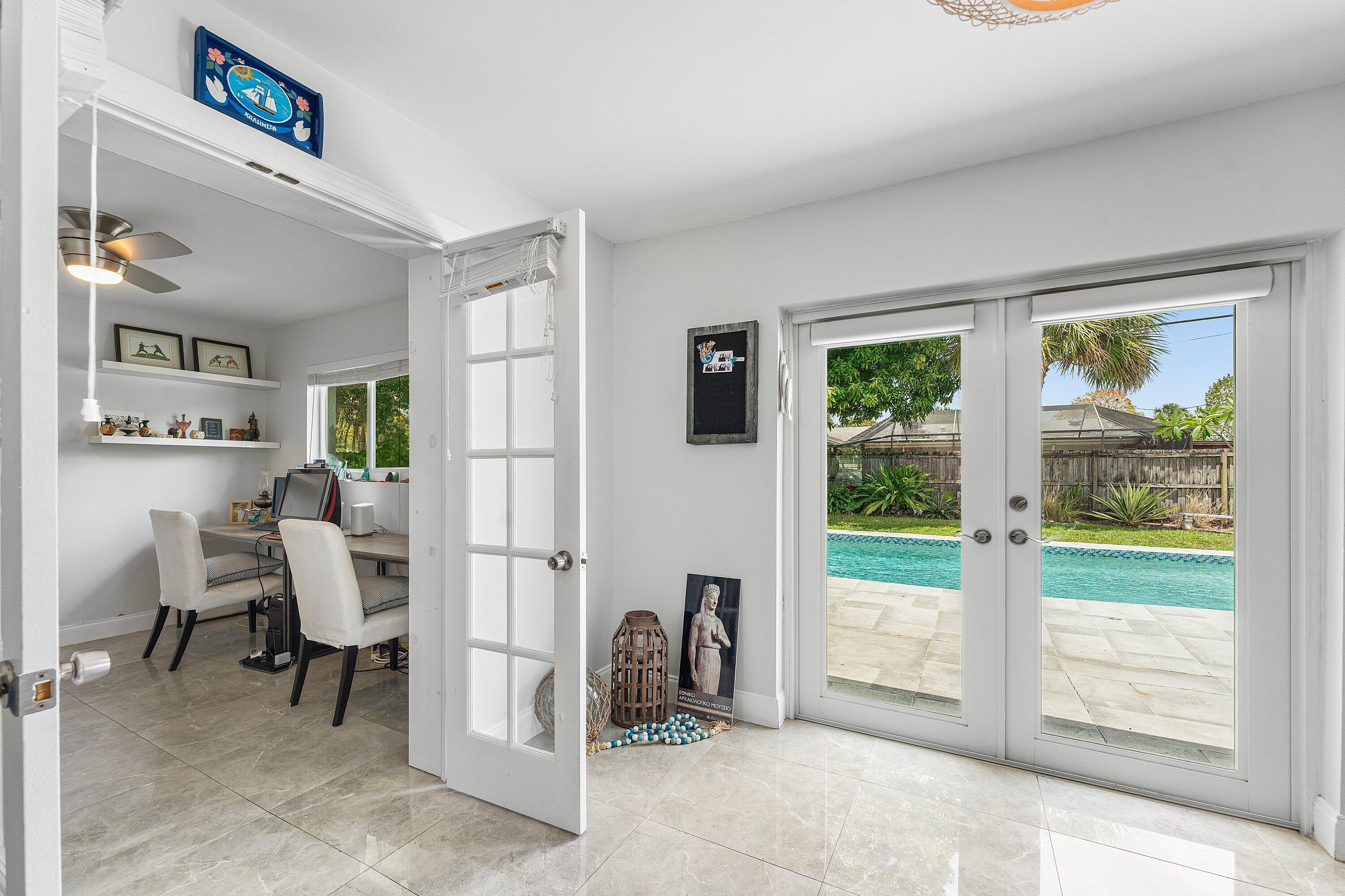 581 Northwest 13th Drive Boca Raton, FL 33486 - Photo 30 of 39 a view of a livingroom with furniture and windows