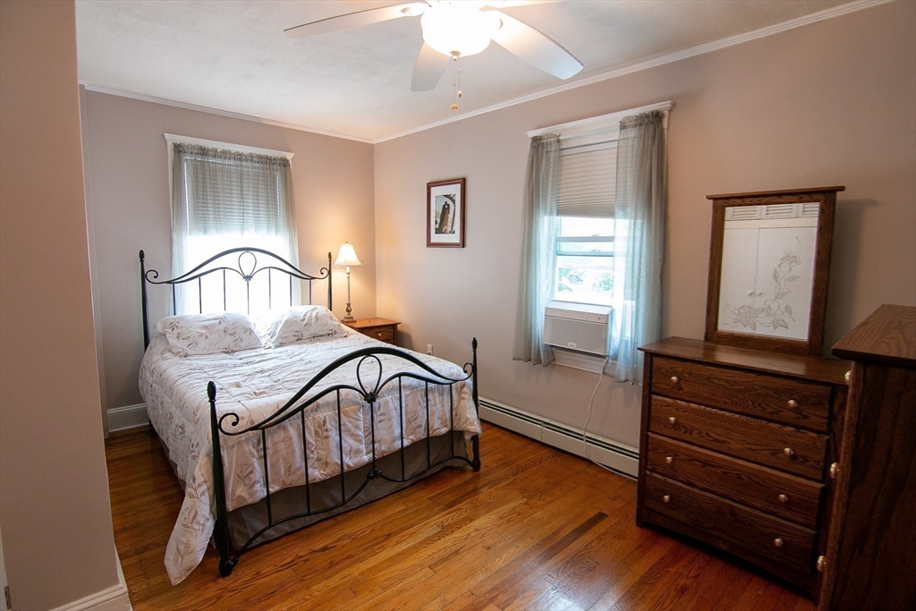 10 Makepeace Street Saugus, MA 01906 - Photo 11 of 36 a bedroom with a bed and a dresser