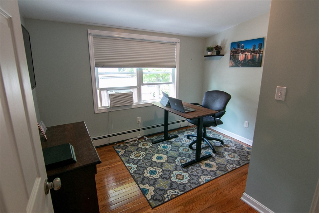 10 Makepeace Street Saugus, MA 01906 - Photo 18 of 36 a living room with chairs and a window