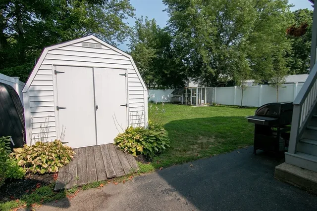 a view of a back yard of the house