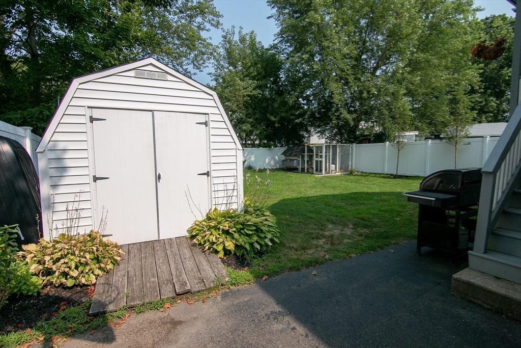 10 Makepeace Street Saugus, MA 01906 - Photo 29 of 36 a view of a back yard of the house
