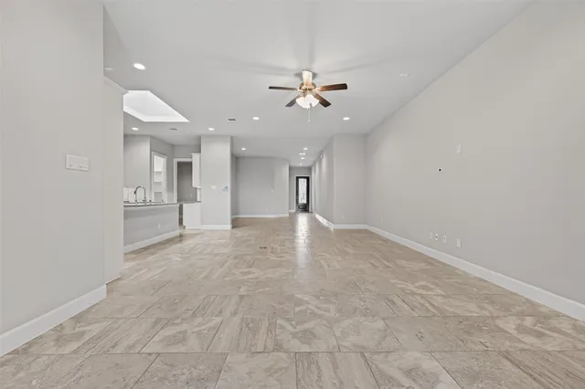 a large kitchen with stainless steel appliances lots of counter top space
