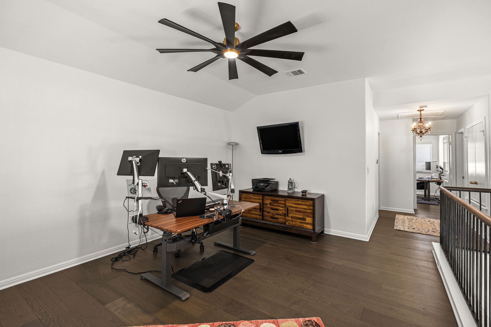 11412 Reading Way Austin, TX 78717 - Photo 23 of 35 a living room with furniture and a flat screen tv