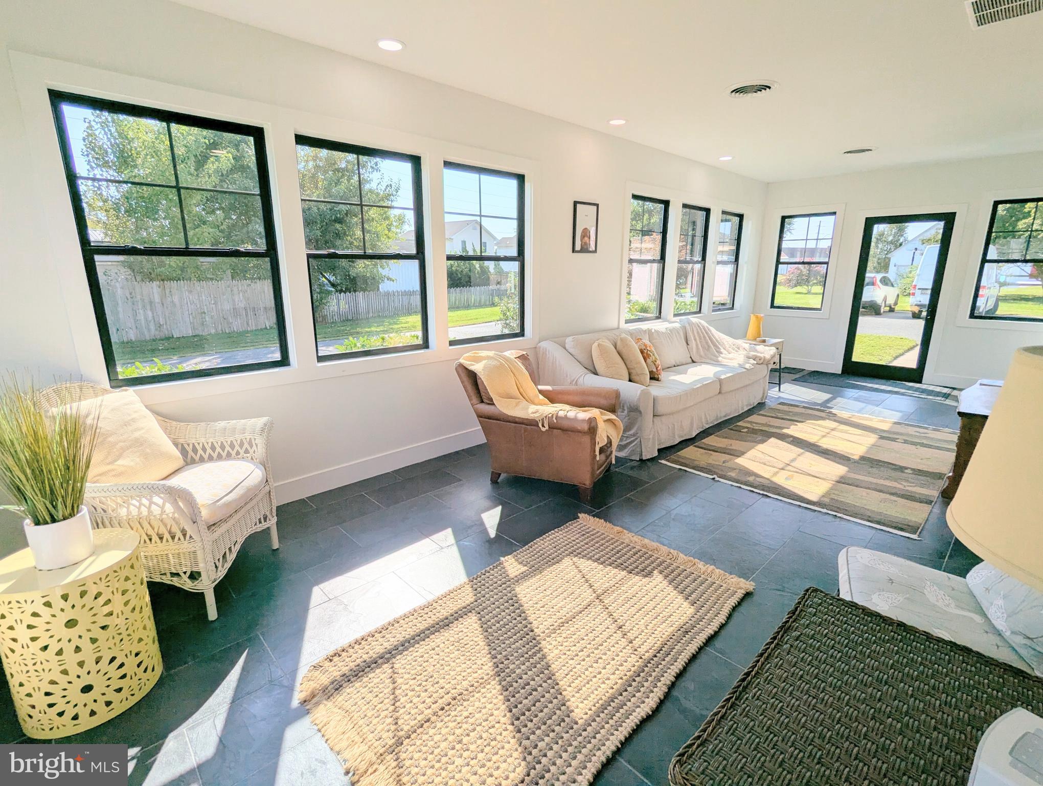 504 Main Street Stevensville, MD 21666 - Photo 5 of 30 a living room with furniture and a window