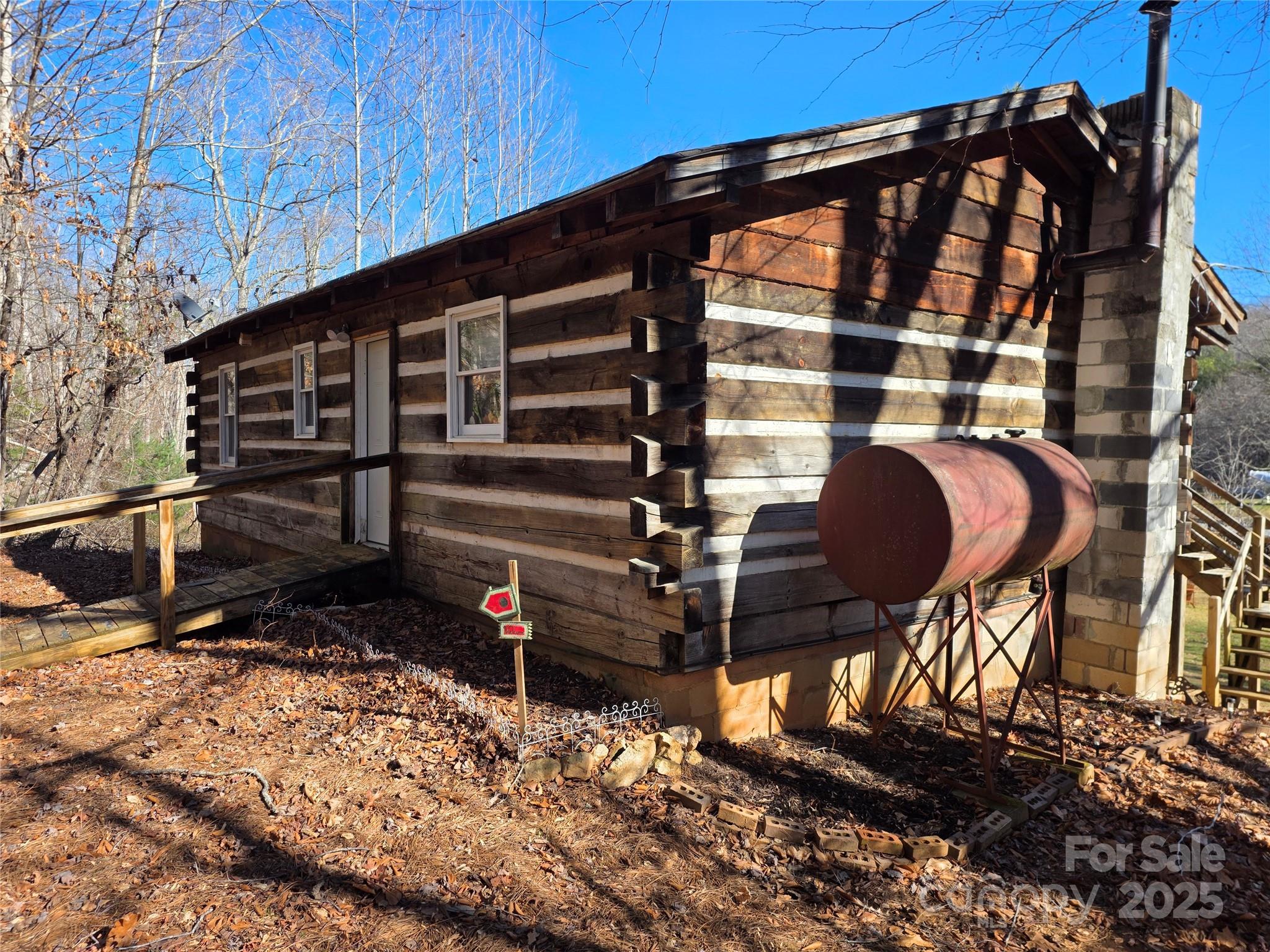 536 Hickory Springs Road Burnsville, NC 28714 - Photo 17 of 26 a front view of a house with a yard