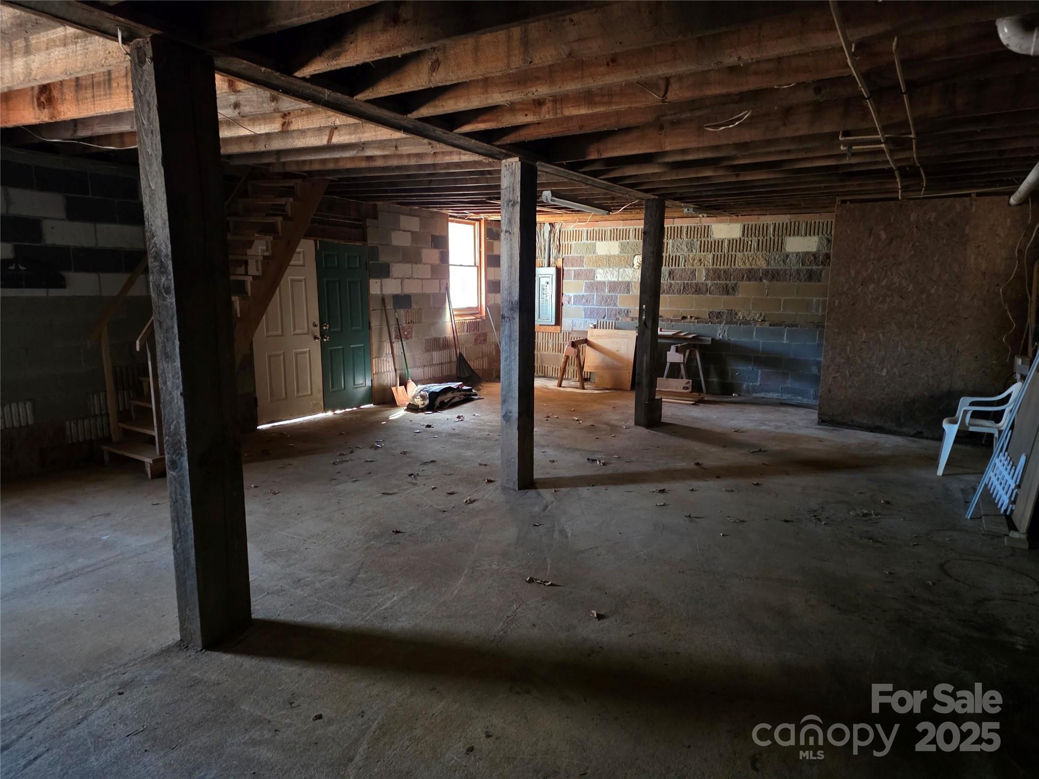 536 Hickory Springs Road Burnsville, NC 28714 - Photo 20 of 26 a view of a room with gym equipment