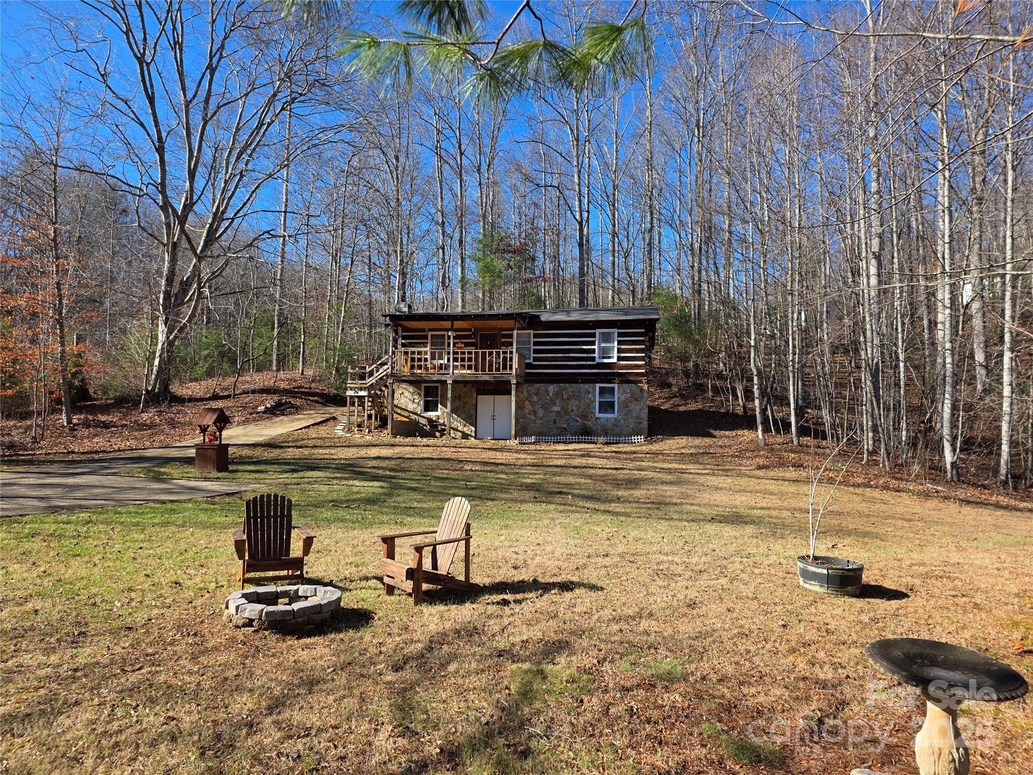 536 Hickory Springs Road Burnsville, NC 28714 - Photo 26 of 26 a view of a swimming pool with a lounge chair