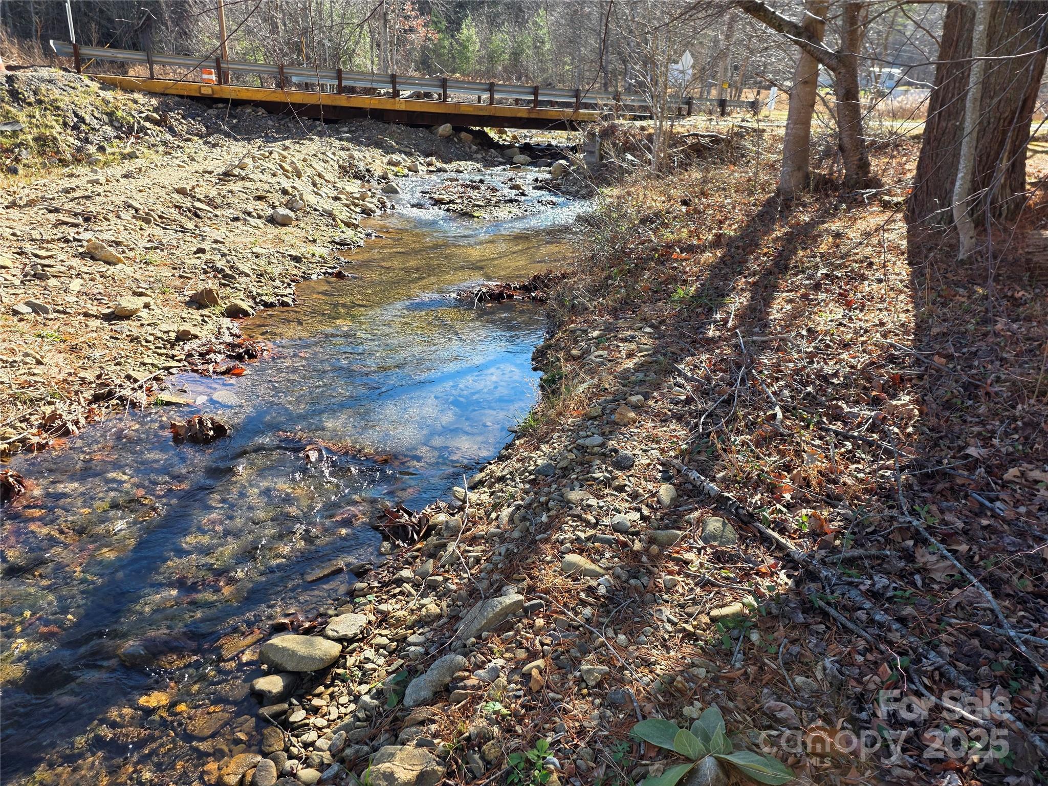 536 Hickory Springs Road Burnsville, NC 28714 - Photo 3 of 26 a view of water from a yard