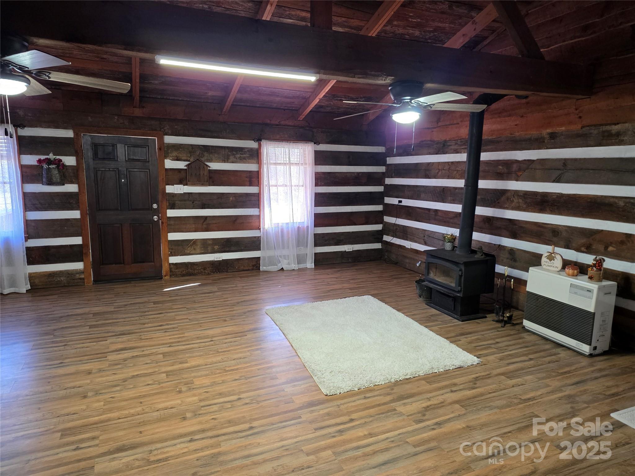 536 Hickory Springs Road Burnsville, NC 28714 - Photo 8 of 26 a room with lots of wooden furniture