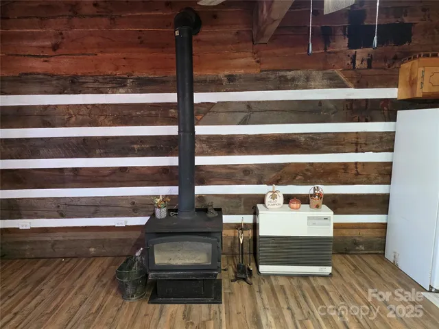 a view of washer and dryer with wooden floor