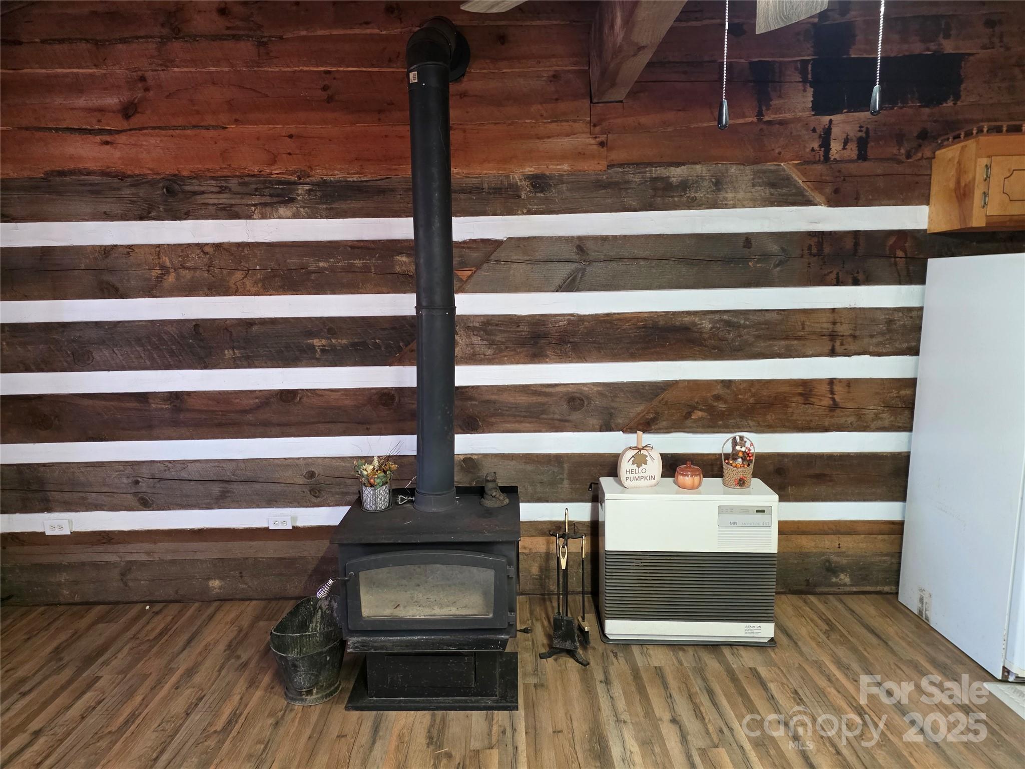 536 Hickory Springs Road Burnsville, NC 28714 - Photo 9 of 26 a view of washer and dryer with wooden floor
